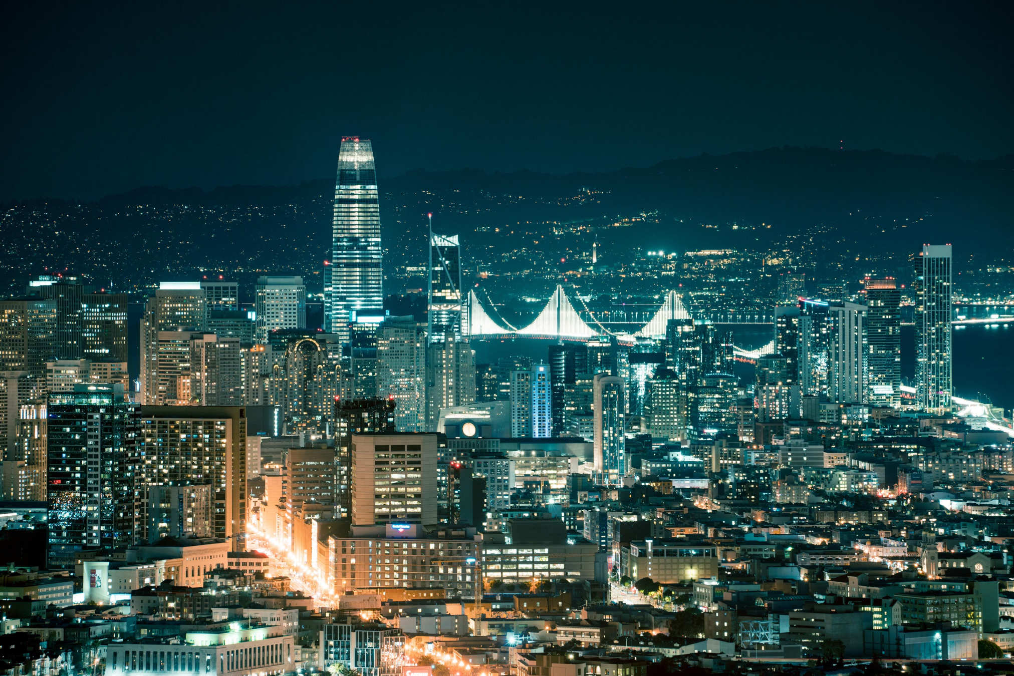 picture of a city with skycrappers and night sky